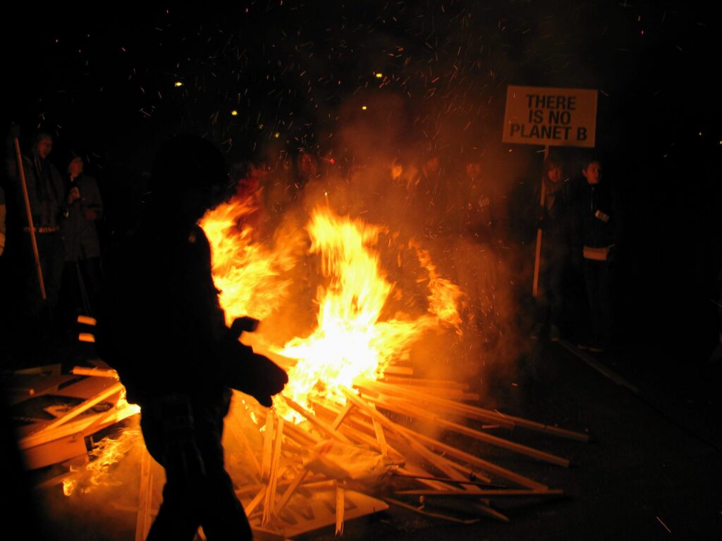 COPENHAGEN, Dec. 12, 2009—Protestors at COP15 make a bonfire of their protest signs. Photo by Jeff McMahon
